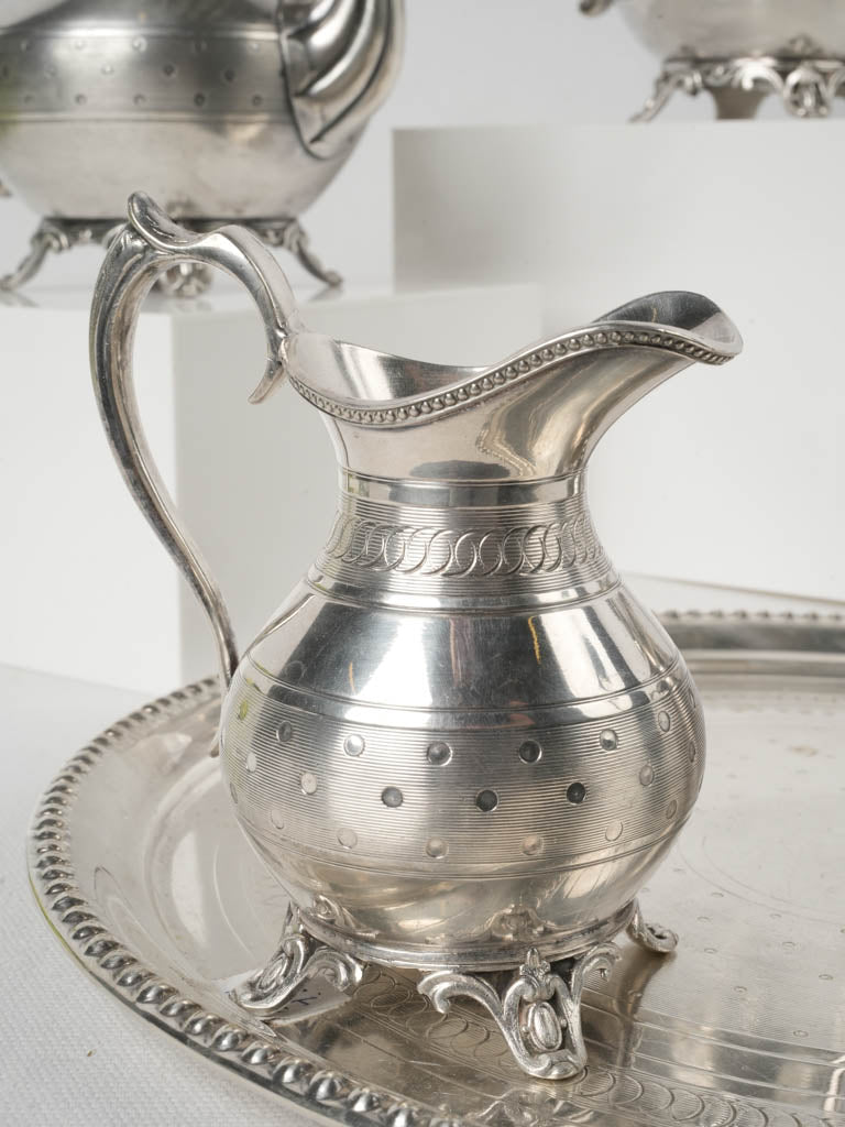 Ornate silver-plated coffee pot