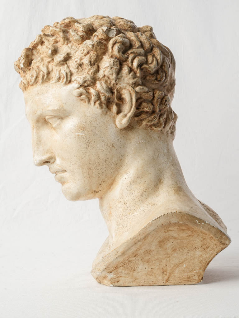 Warm-toned antique sculpture piece