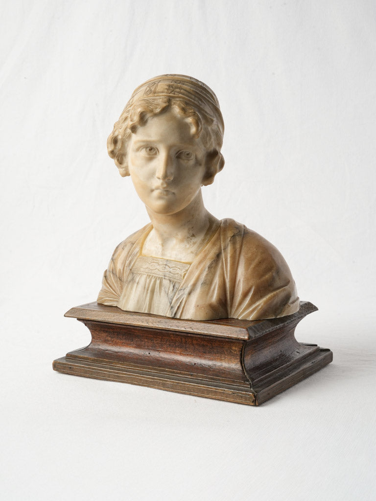 Graceful antique marble bust sculpture