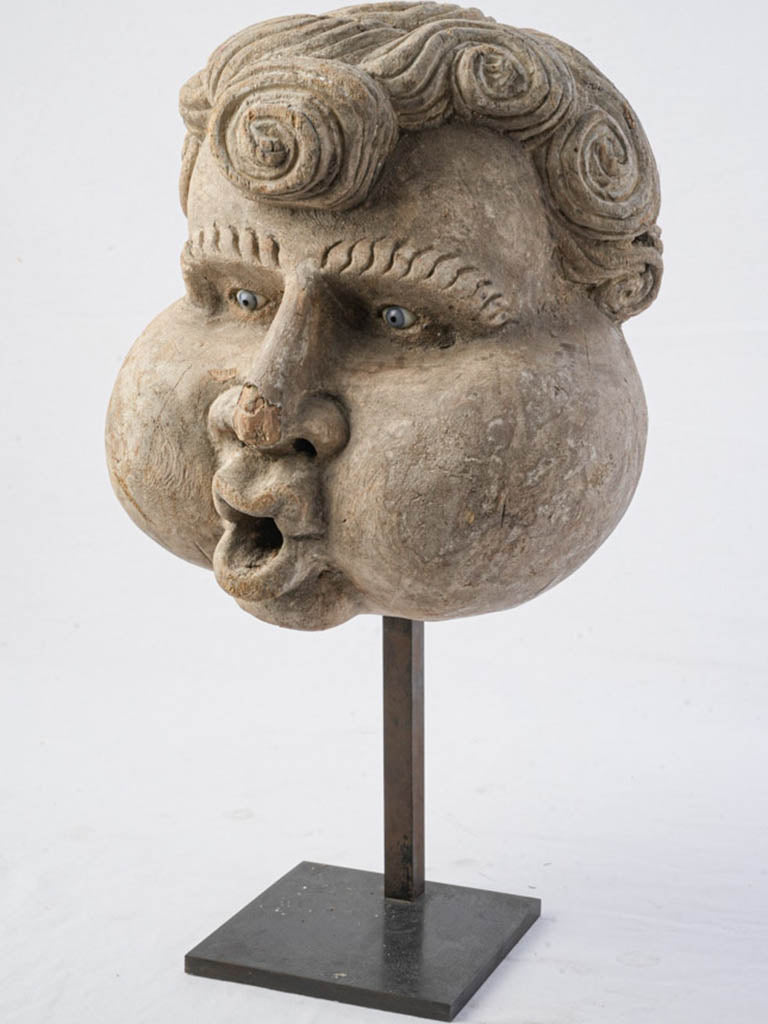 Antique expressive cork sculpture