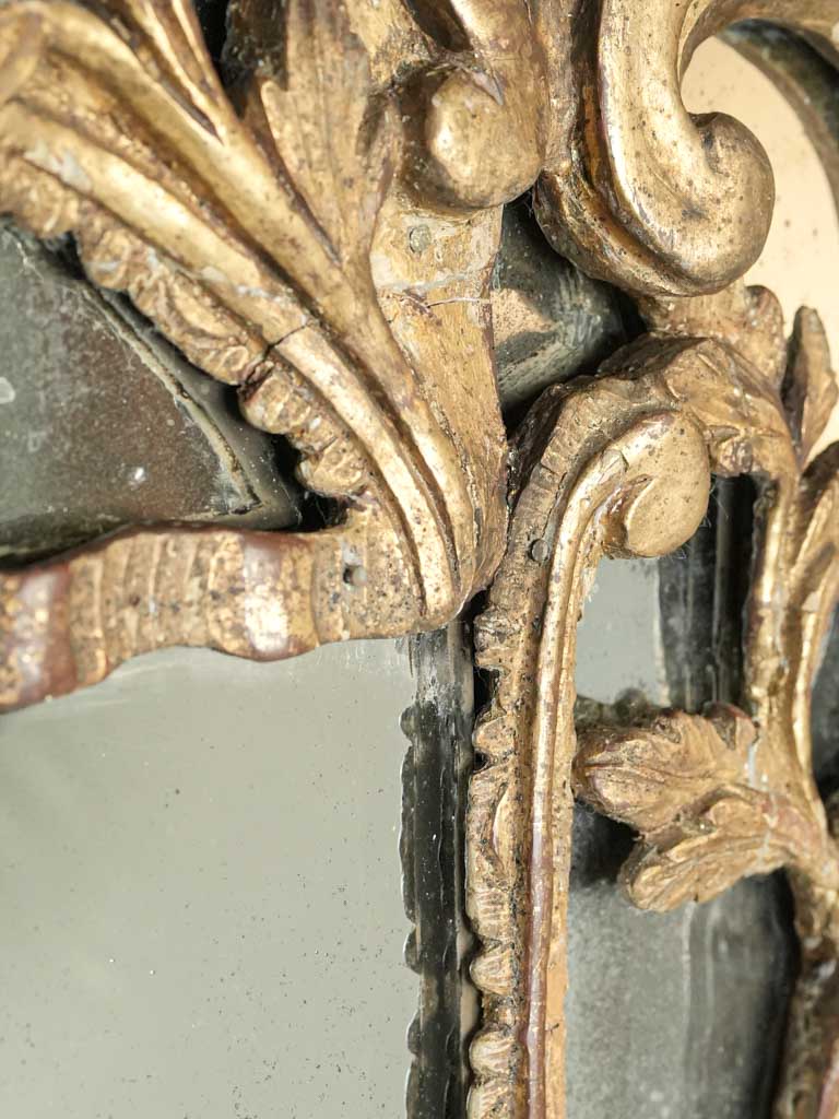 Slender mirrored parcloses wall piece