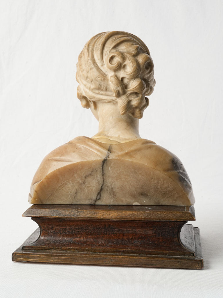 Introspective girl's portrait sculpture