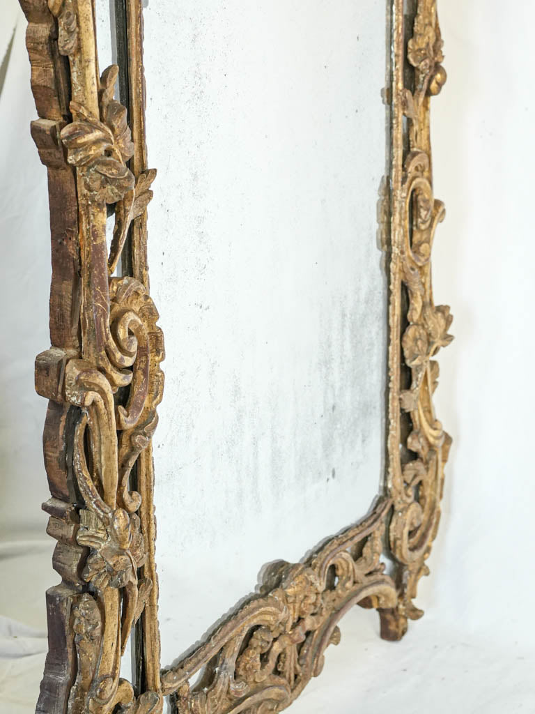 Intricate openwork crest mirror