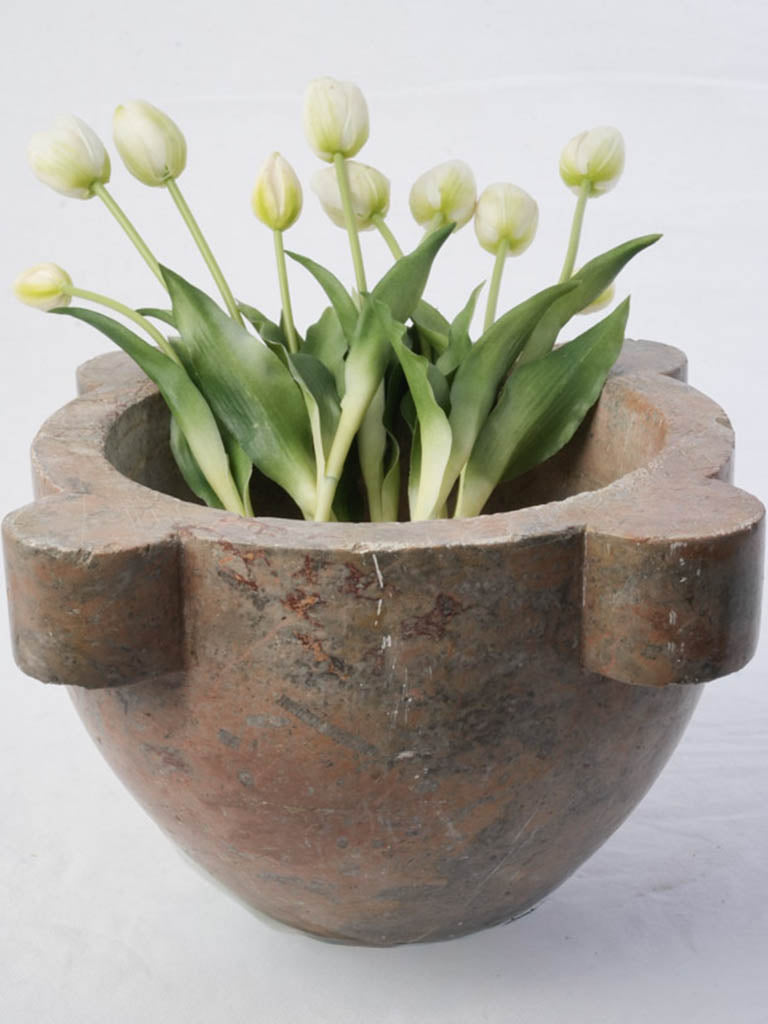 Elegant polychrome stone vessel