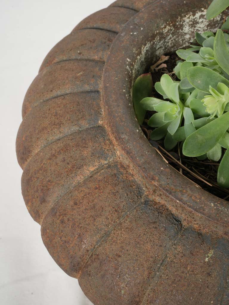 Durable solid material planters  