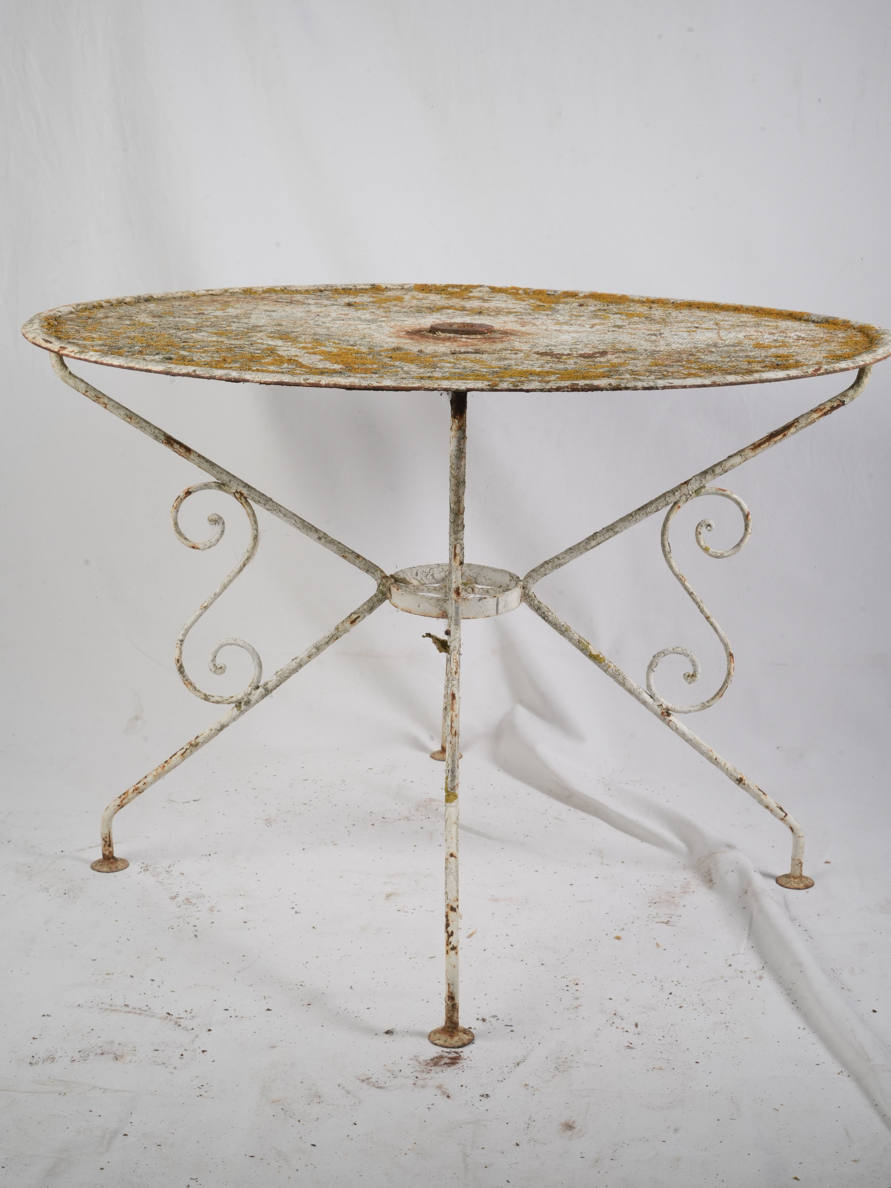 Leafy courtyard French iron table