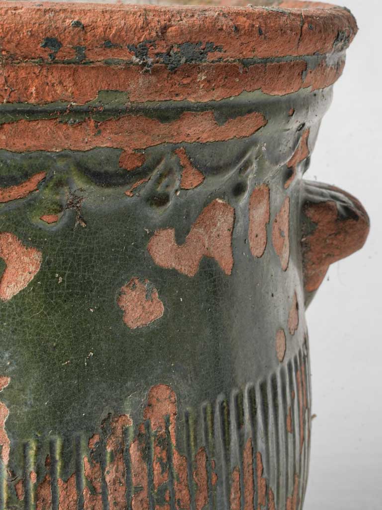 Patina-rich vintage terracotta planter