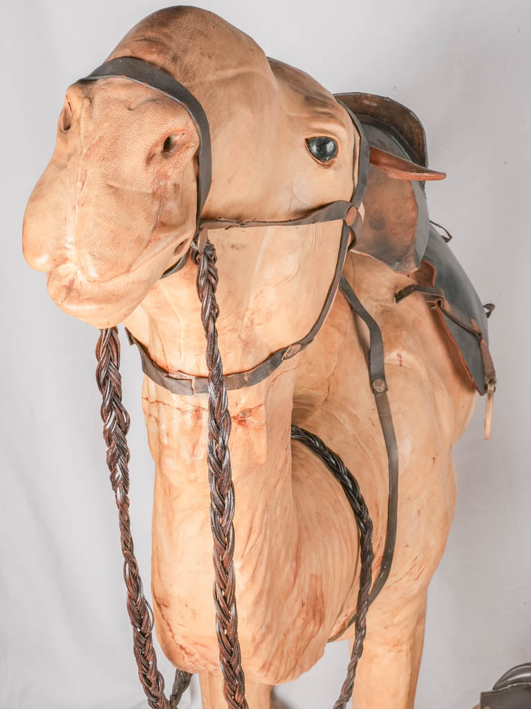 Handcrafted leather dromedary sculpture, glass-eyed