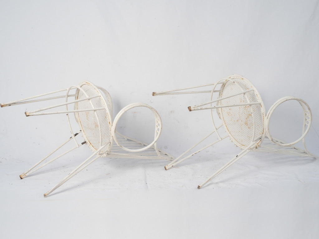 Classic French iron armchairs