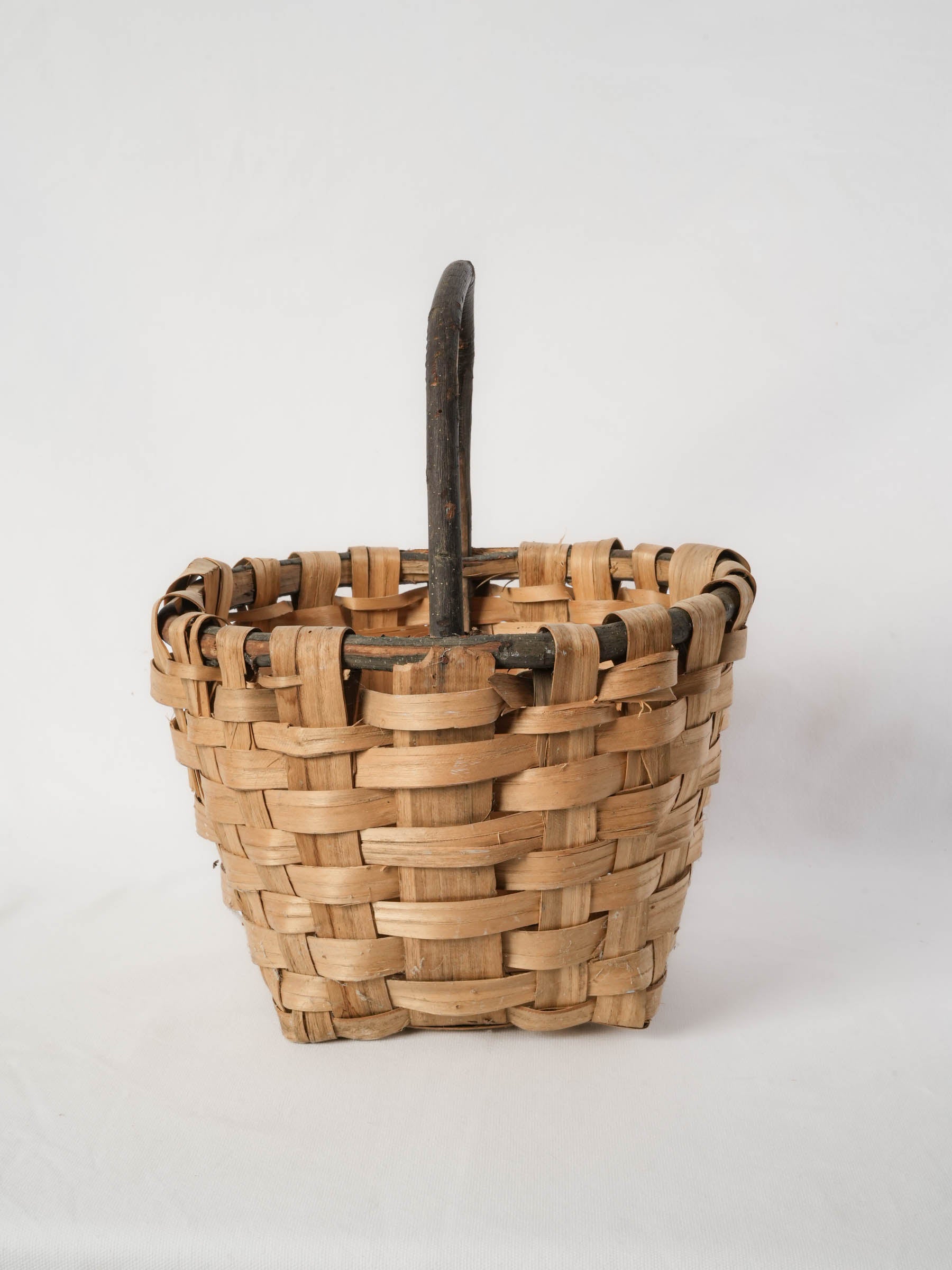 Woven Reed Harvest Basket with Dark Wood Handle