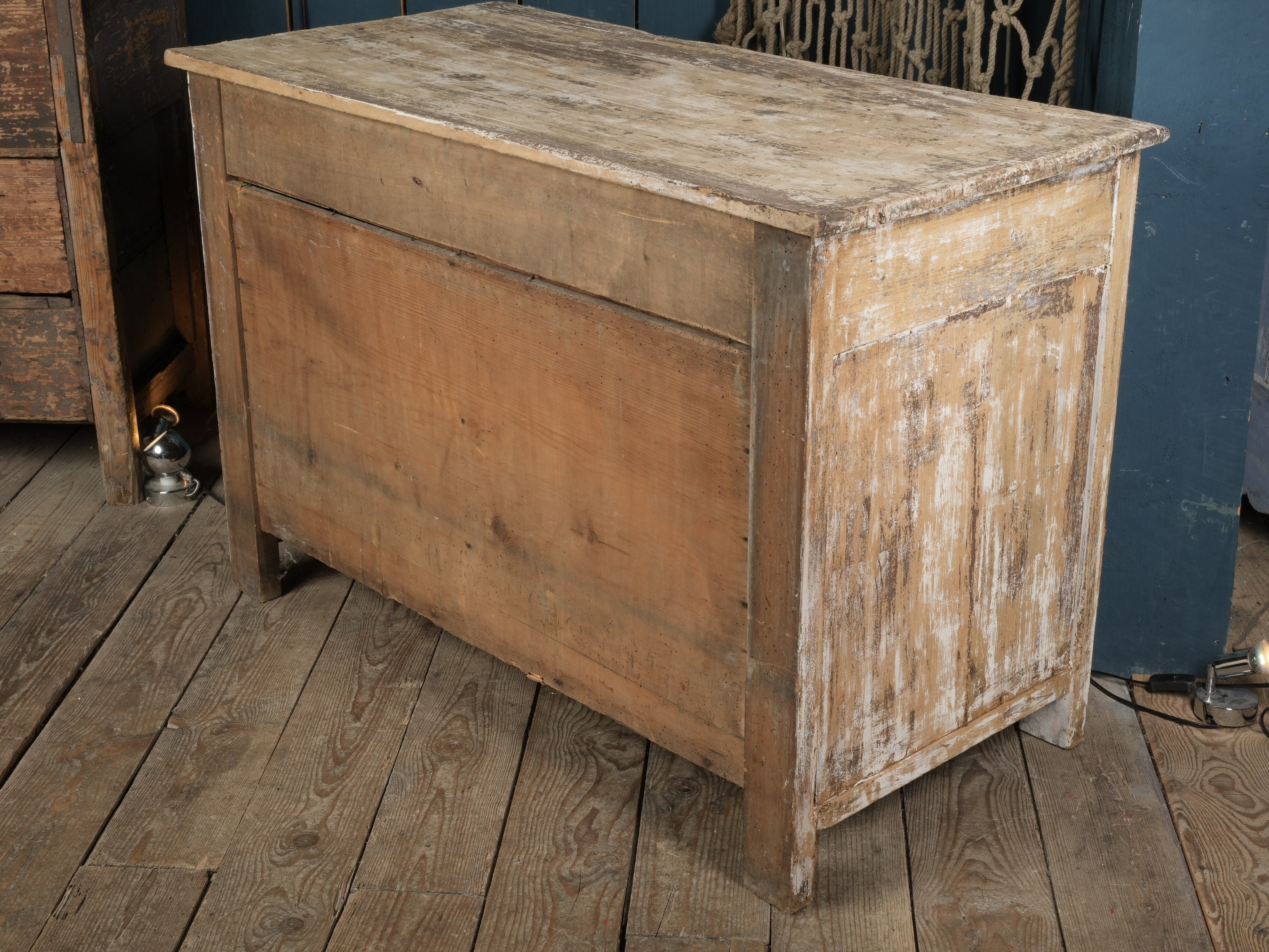 Raw wood exposed antique cupboard