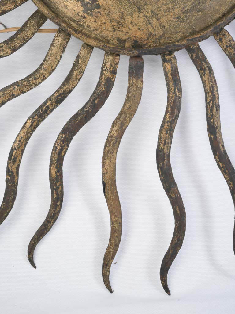 Timeworn patina sun motif light