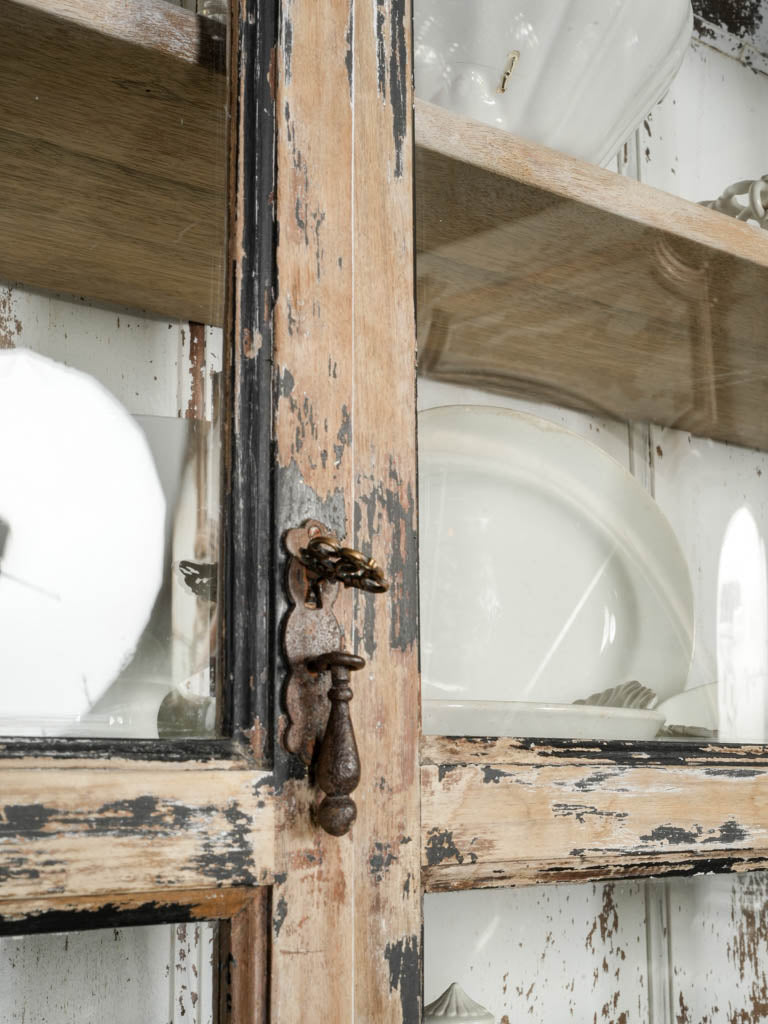 Ornate antique wooden glass cabinet
