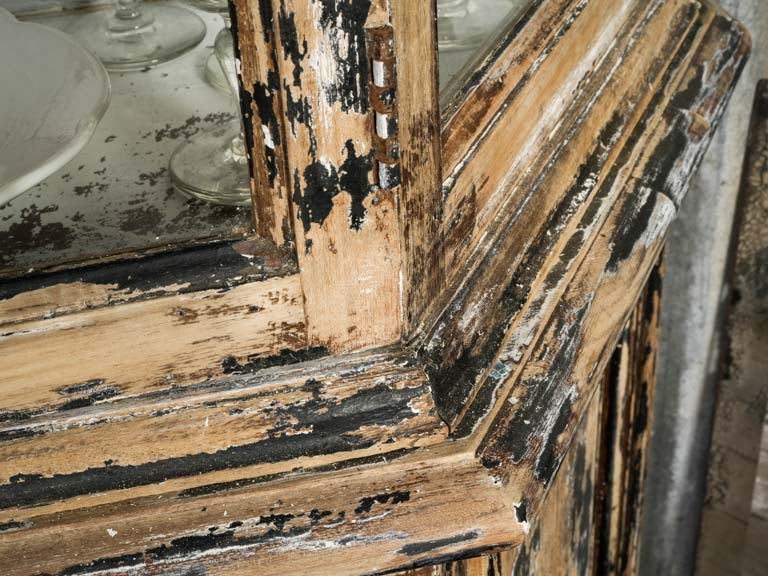 Elegant molded paneling vitrine cabinet