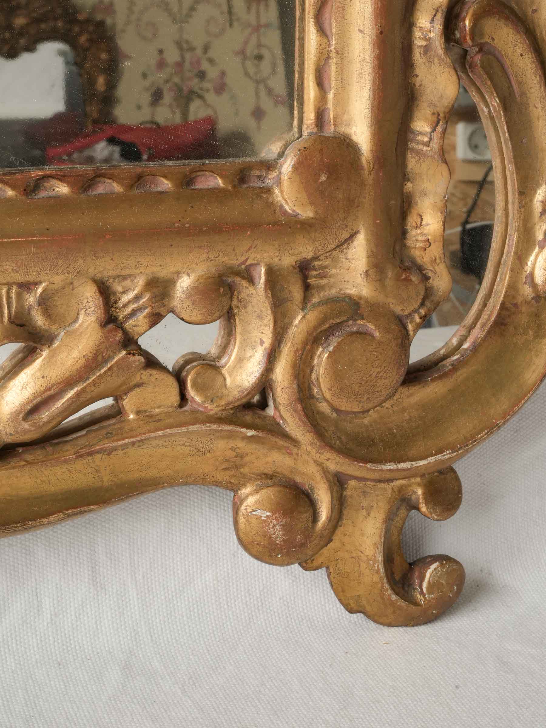 Ornate carved rocaille C-scrolls mirror