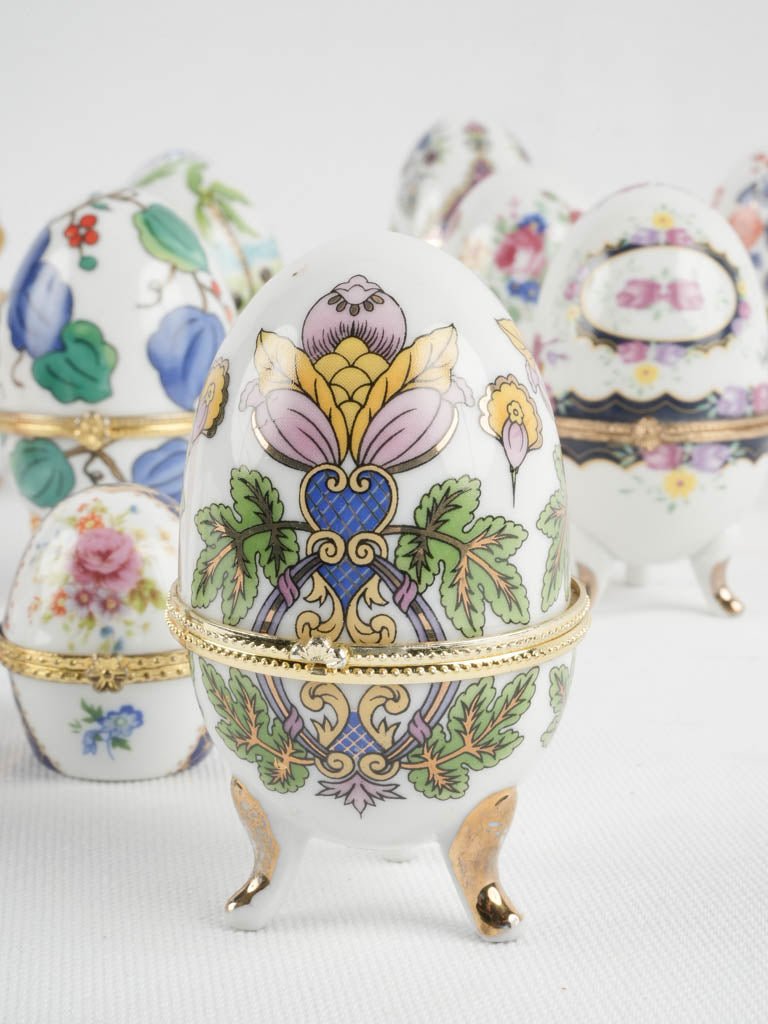 Collection of 16 porcelain hinged egg containers 4"