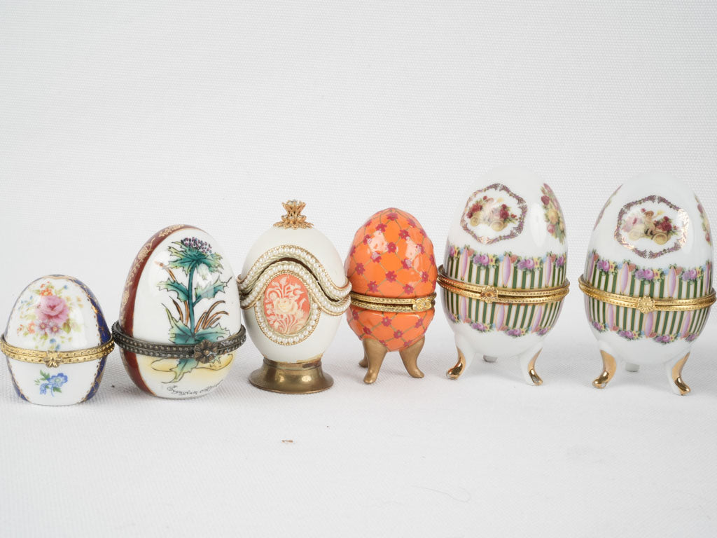 Collection of 16 porcelain hinged egg containers 4"