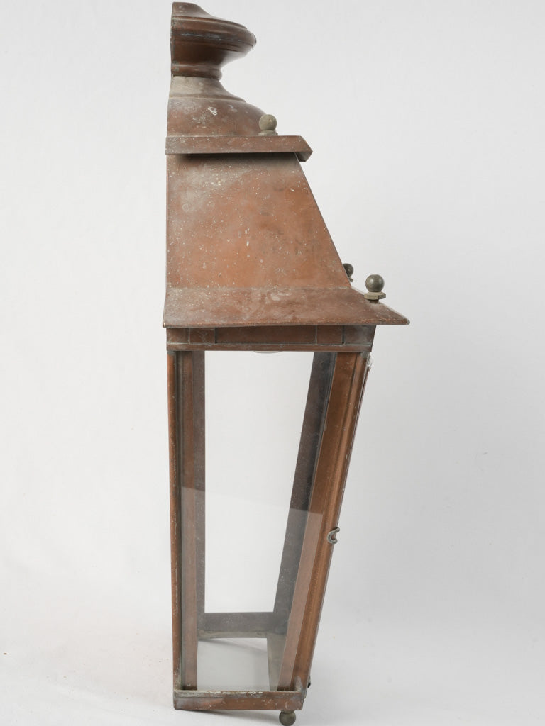 Aged exterior copper wall lamp
