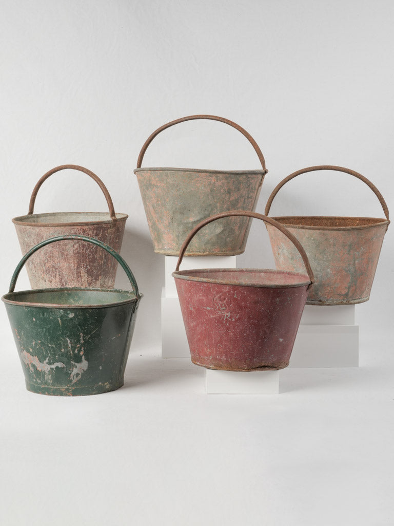 Weathered metal harvest baskets