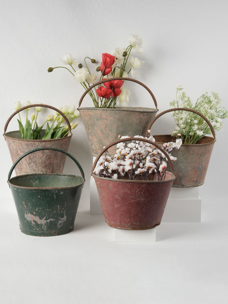Vintage rusted harvest buckets