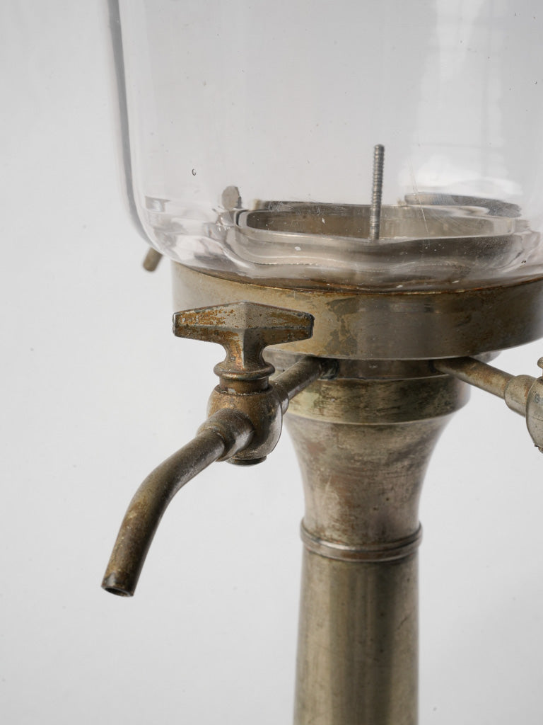 Patinaed four-spigot absinthe dispenser