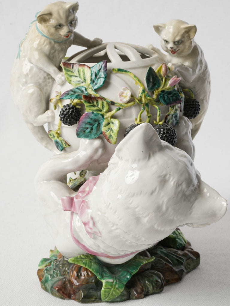 Vintage cat-themed porcelain figurine  