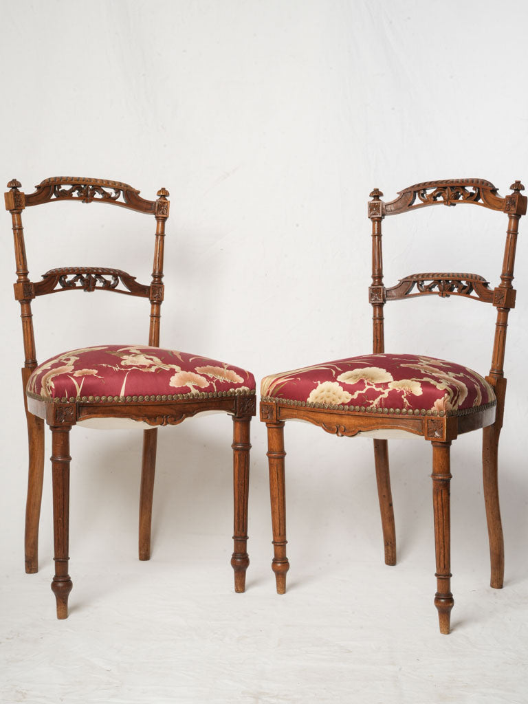 Petite carved walnut occasional chairs