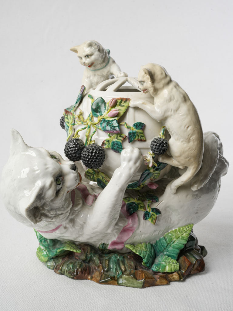 Detailed sculpted cat family vase  