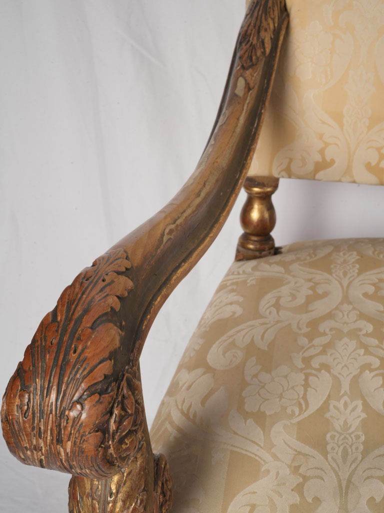 Elegant damask-upholstered armchairs