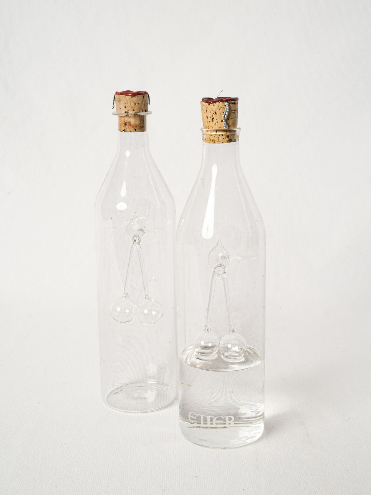 Pair of Swiss Blown Glass Kirsch Carafes with Cherry Sculpture
