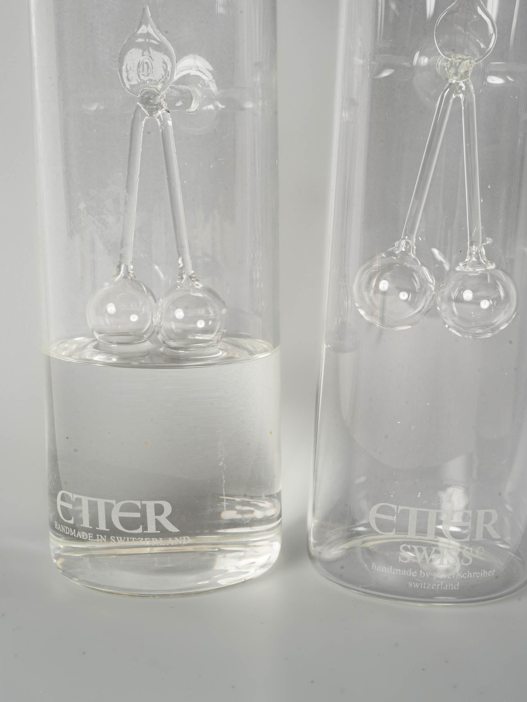 Pair of Swiss Blown Glass Kirsch Carafes with Cherry Sculpture