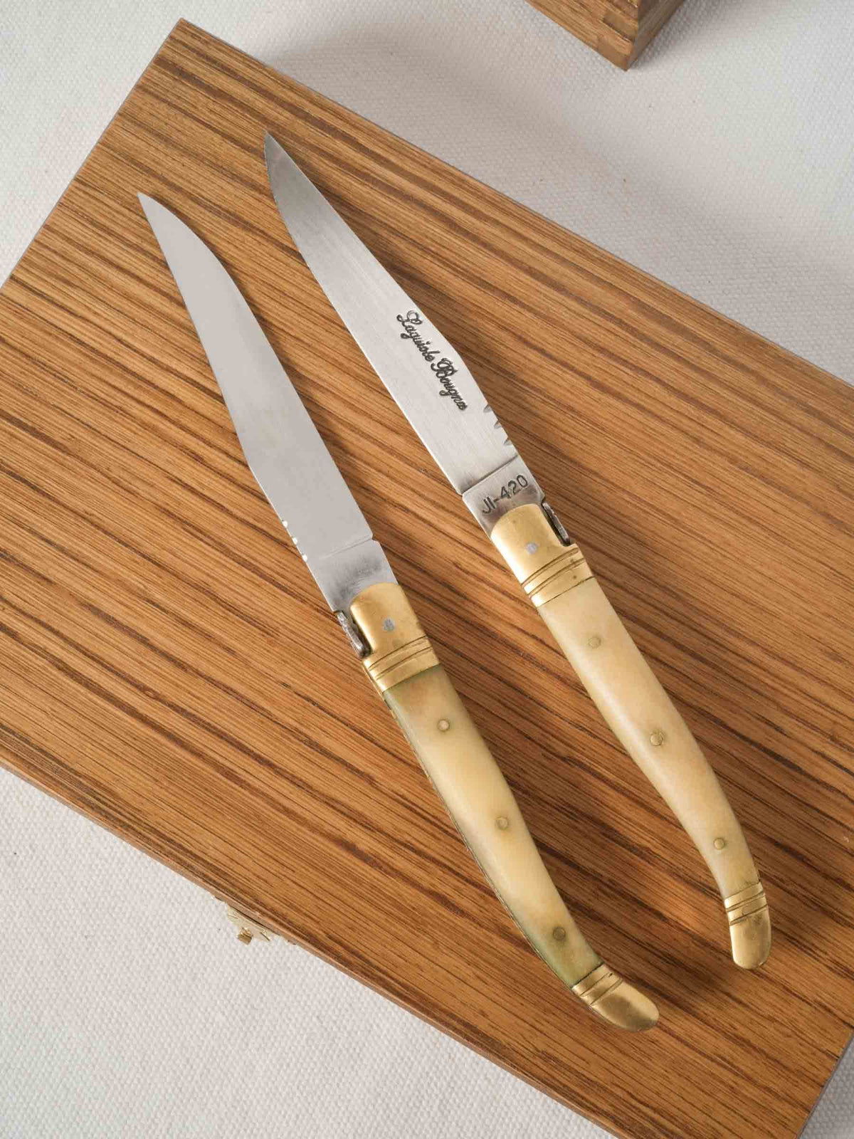Set of 12 French Laguiole Horn Handle Steak Knives in Oak Cases
