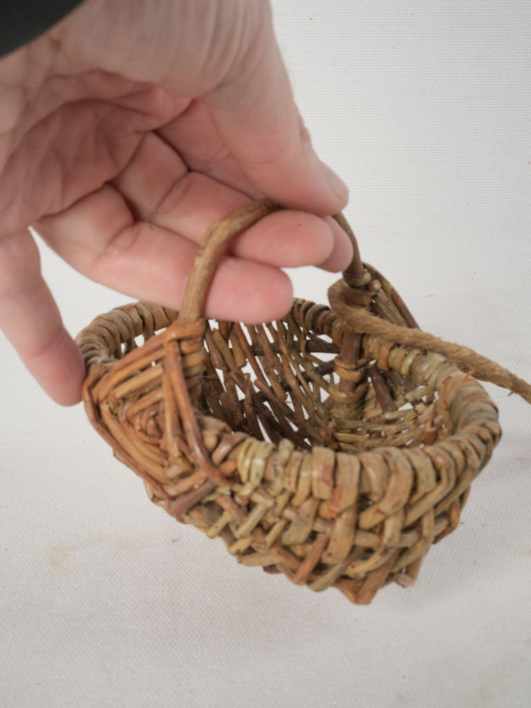 Antique rustic woven child's basket