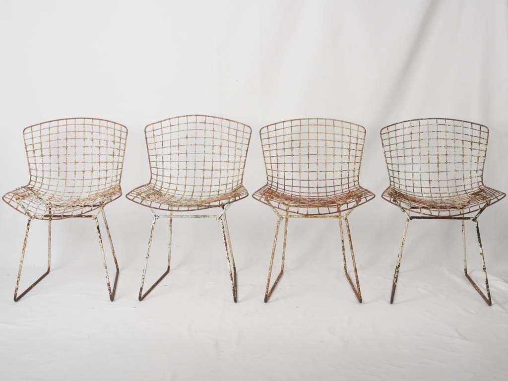 Classic weathered Bertoia exterior seating
