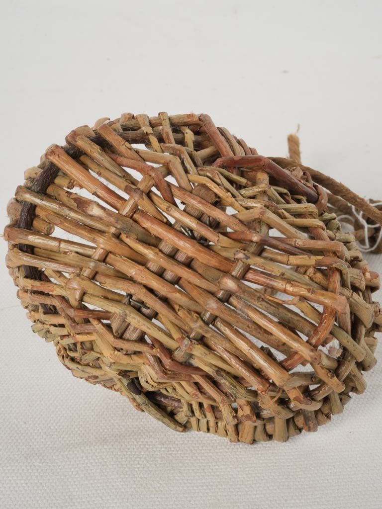 Detailed early-century doll’s basket