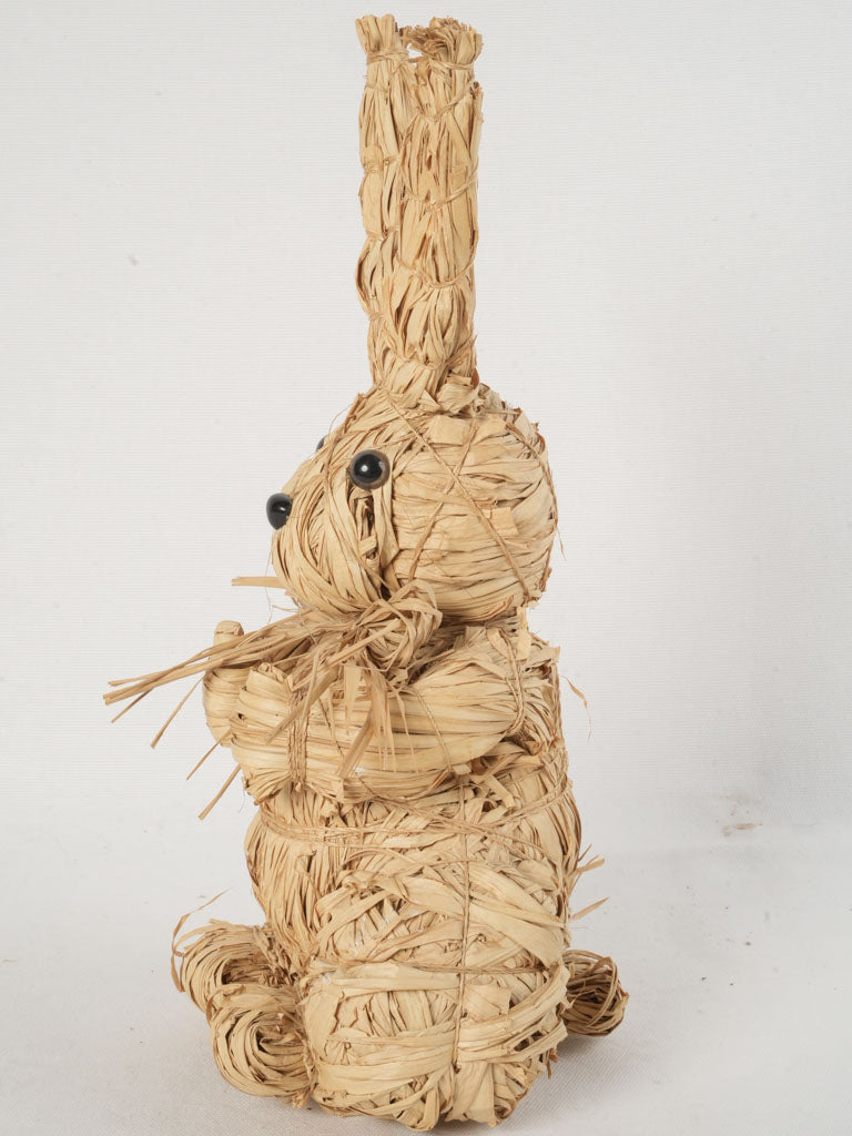 Handcrafted natural raffia figurine