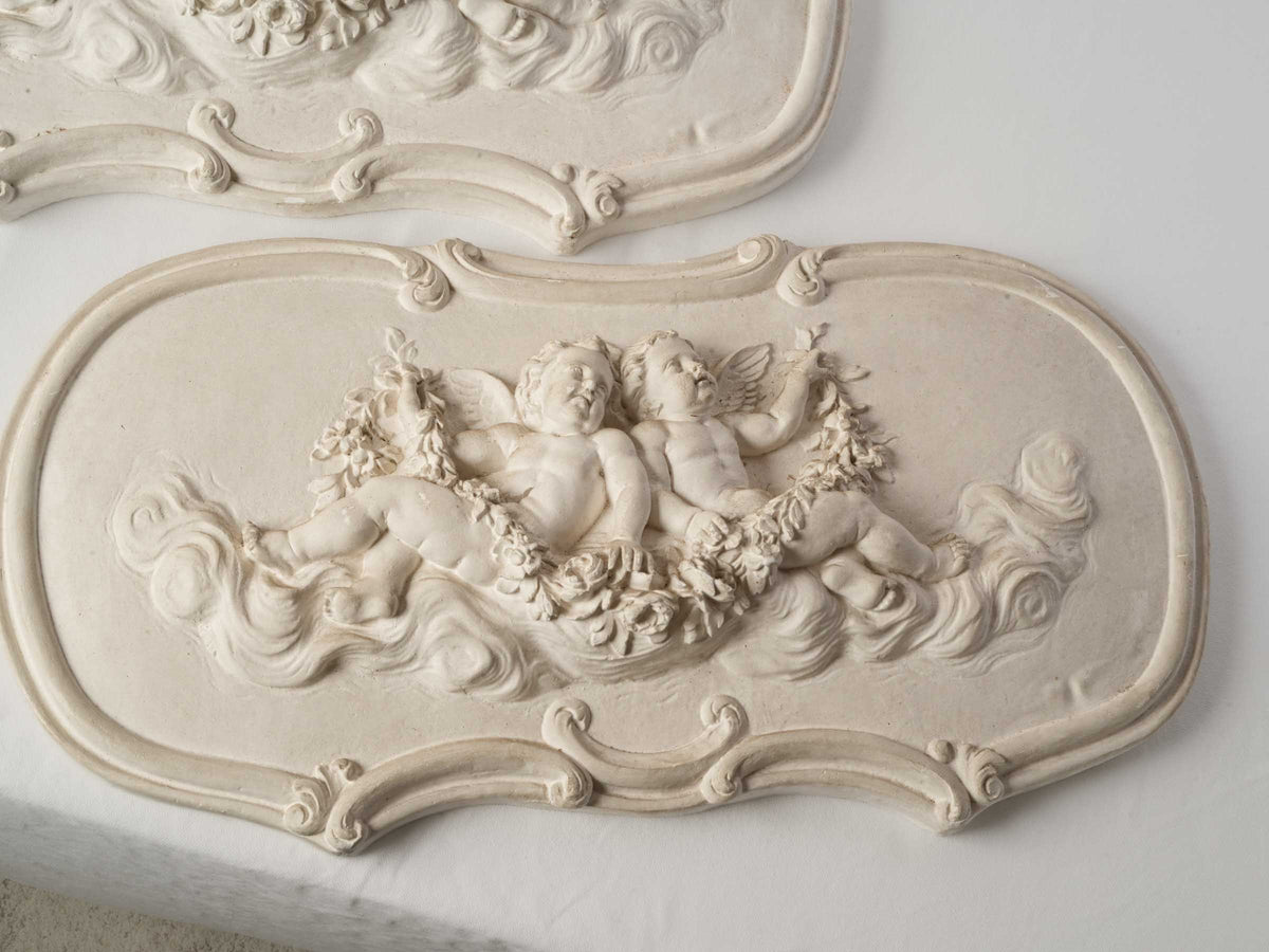 Pair of French Plaster Overdoor Panels with Cherubs, circa 1900 - 14½" x 27½"