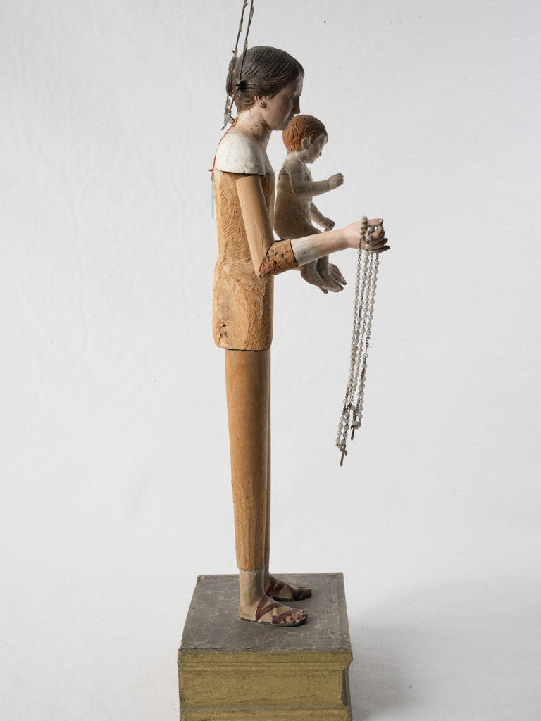 Intricate sulfide-glass-eyed statue