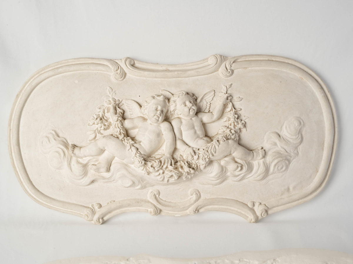 Pair of French Plaster Overdoor Panels with Cherubs, circa 1900 - 14½" x 27½"