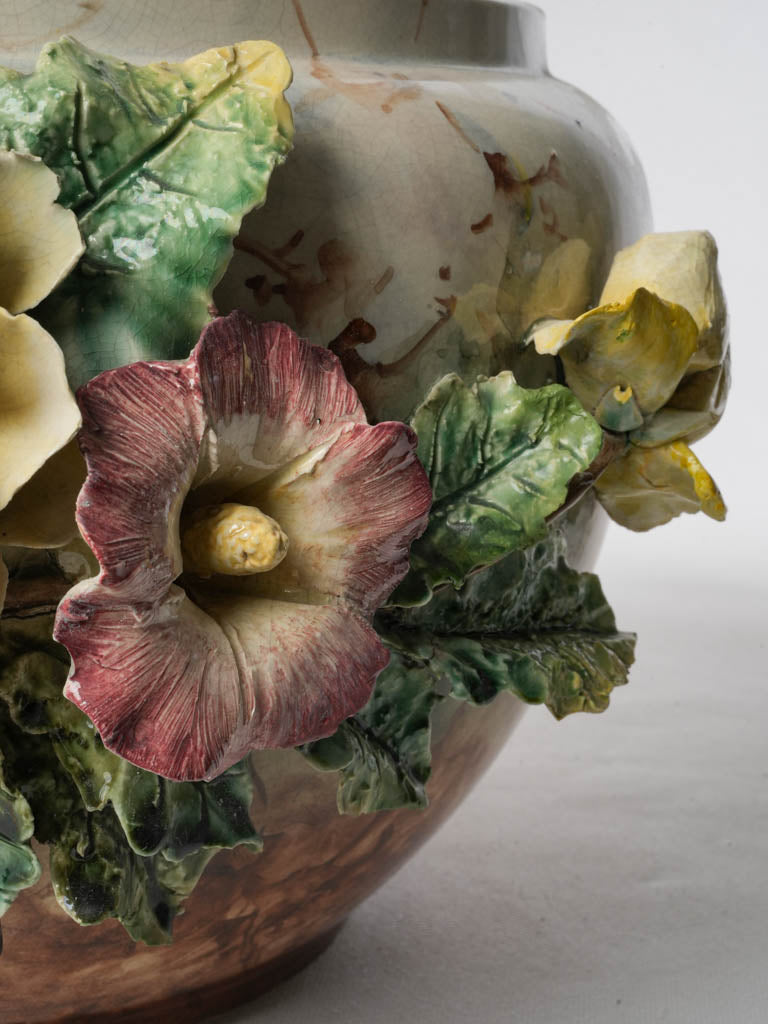 Lavishly decorated barbotine ware vessel