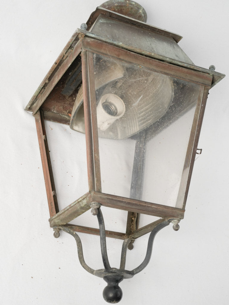 Classic aged French village street lamp