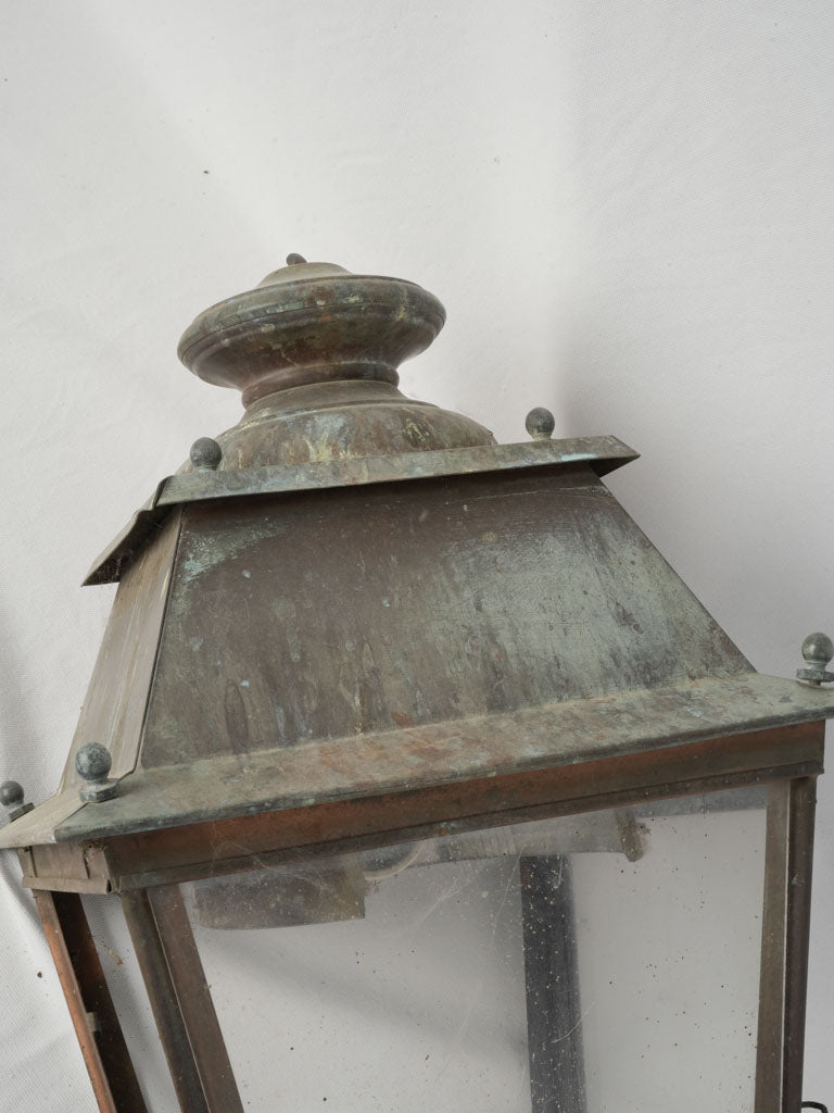 Elegant, aged copper street pendant light
