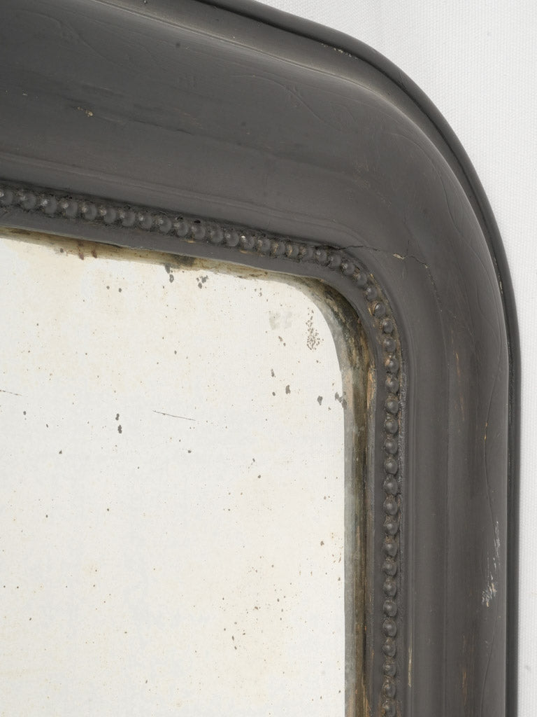 Ornate decorative arts mirror