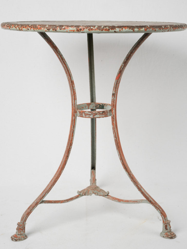 Distressed, weathered, European wrought-iron table