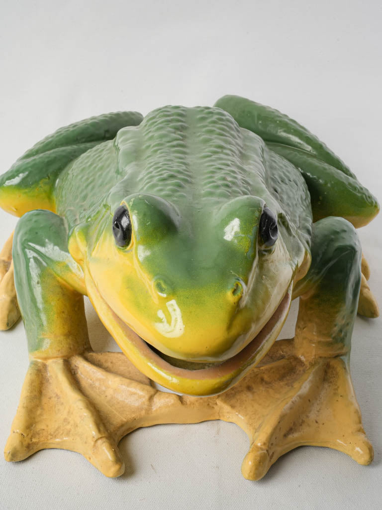 Playful vibrant naturalistic frog figurine