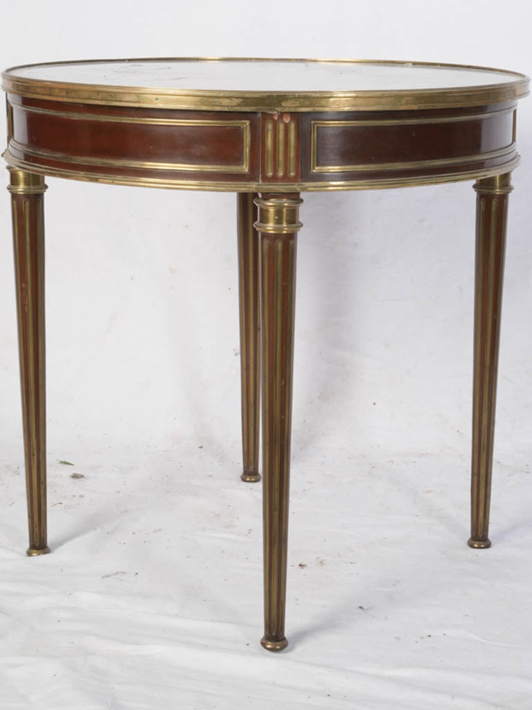 Slender fluted leg accent table