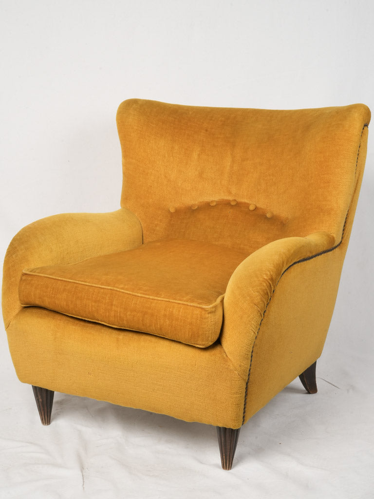 Luxurious vintage mustard velvet armchair