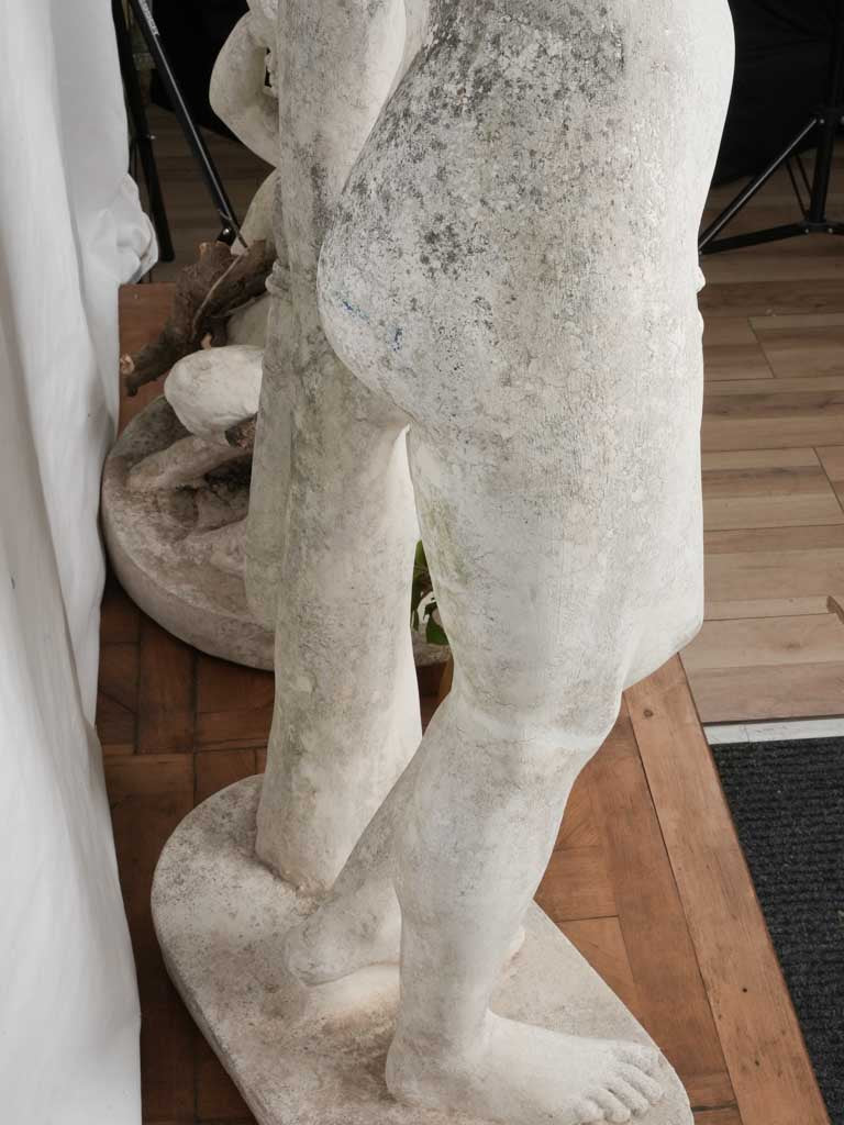 Detailed concrete Apollo and Bacchus
