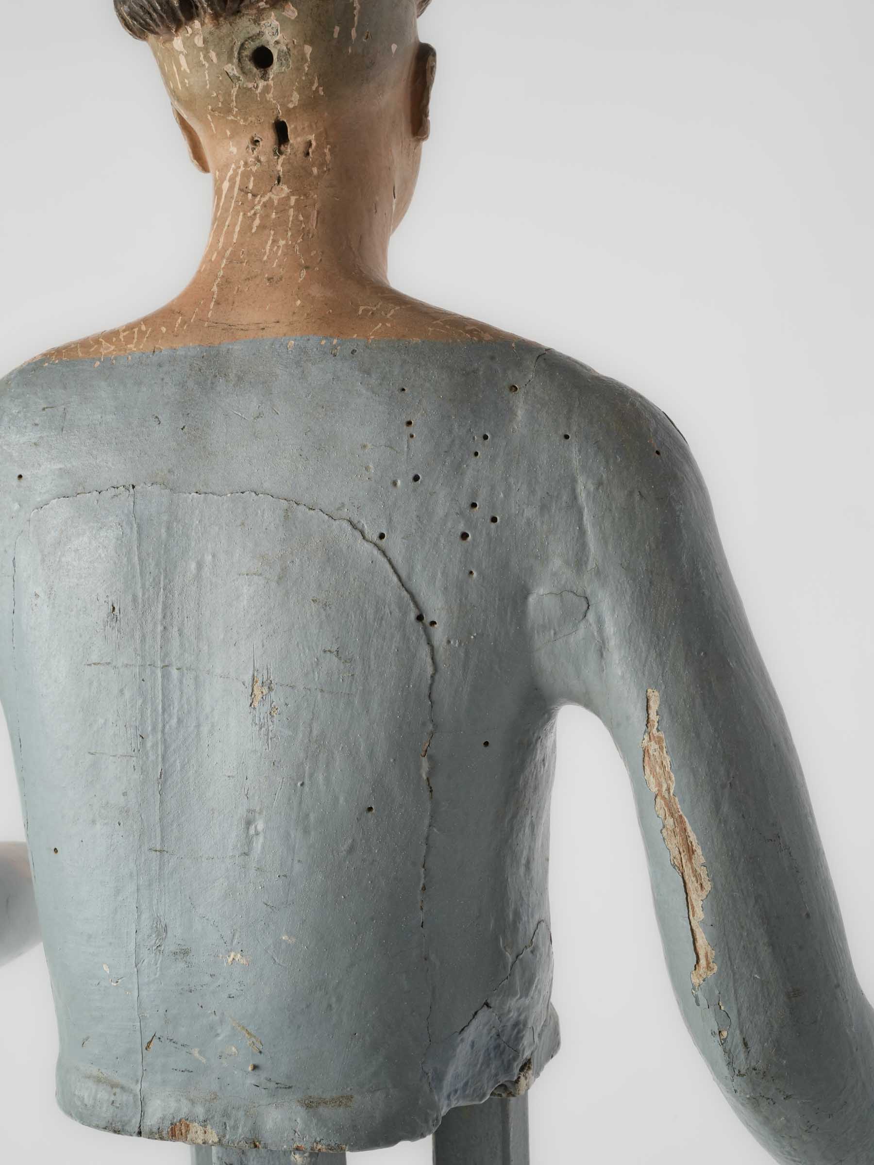 Restored patina capipote sculpture