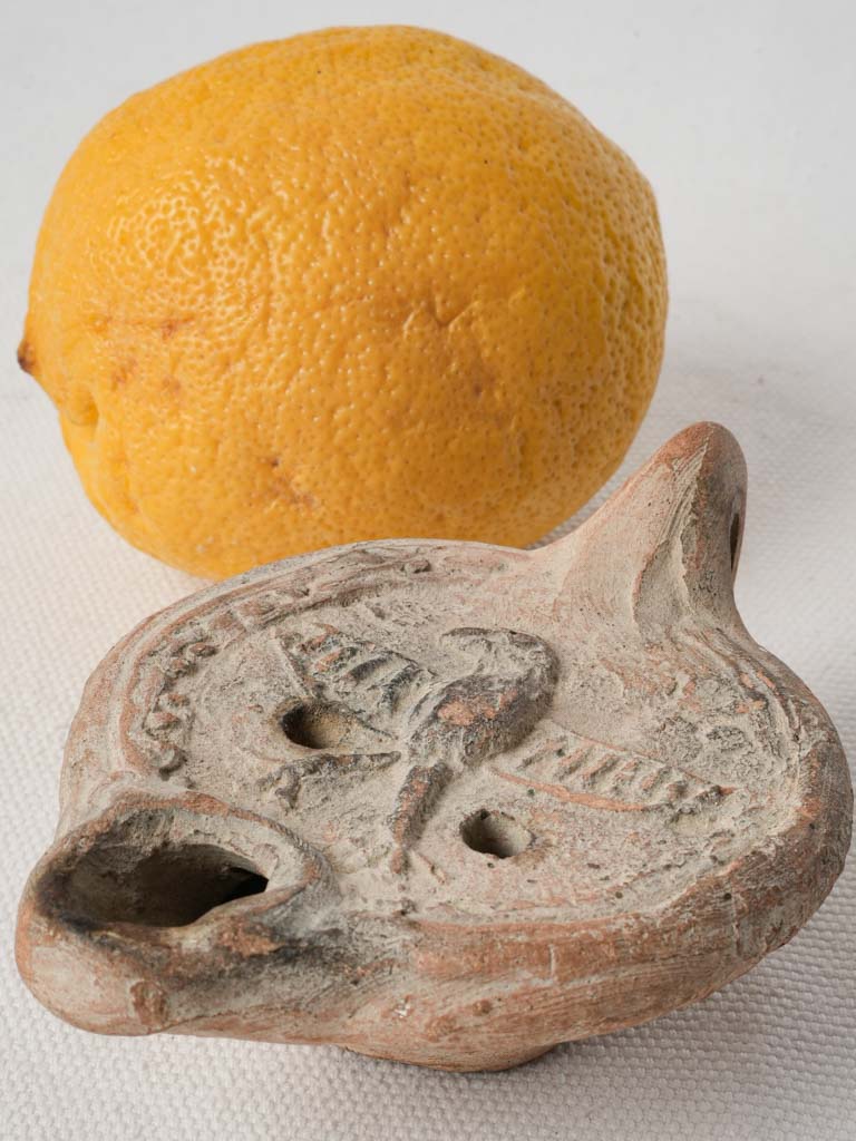 Roman-era ceramic oil lamp relic